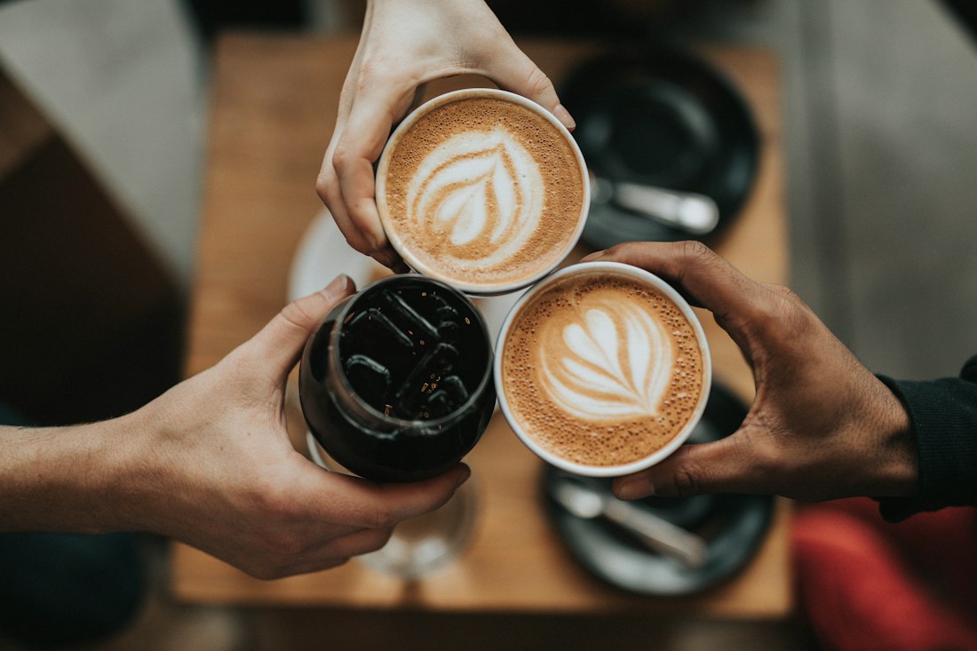 Flat white coffee on a café table